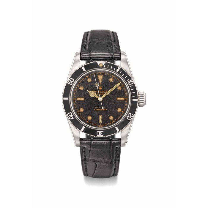 Rolex Rolex. A fine and very rare stainless steel automatic wristwatch with tropical gilt 2-line dial, big crown and painted “lollipop” centre seconds Signed Rolex, Oyster Perpetual, 200m=660ft, Submariner, ref. 6538, case no. 307’387, manufactured in 1957