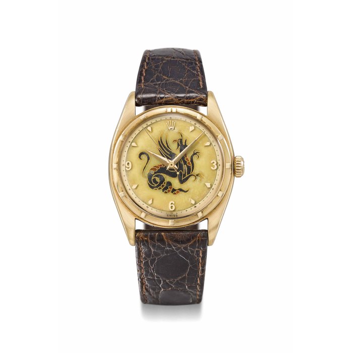 Rolex. A highly important and exceptionally rare 18K gold automatic wristwatch with sweep centre seconds and cloisonné enamel dial depicting a dragon by Nelly Richard Signed Rolex, Perpetual Chronometer, ref. 6099, movement no. 53814, case no. possibly ?852?8, circa 1952