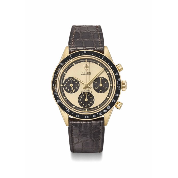Rolex. A fine, rare and attractive 18K gold chronograph wristwatch with champagne "Paul Newman" dial Signed Rolex, Cosmograph, Daytona, ref. 6241, no. 1’757’892, circa 1968