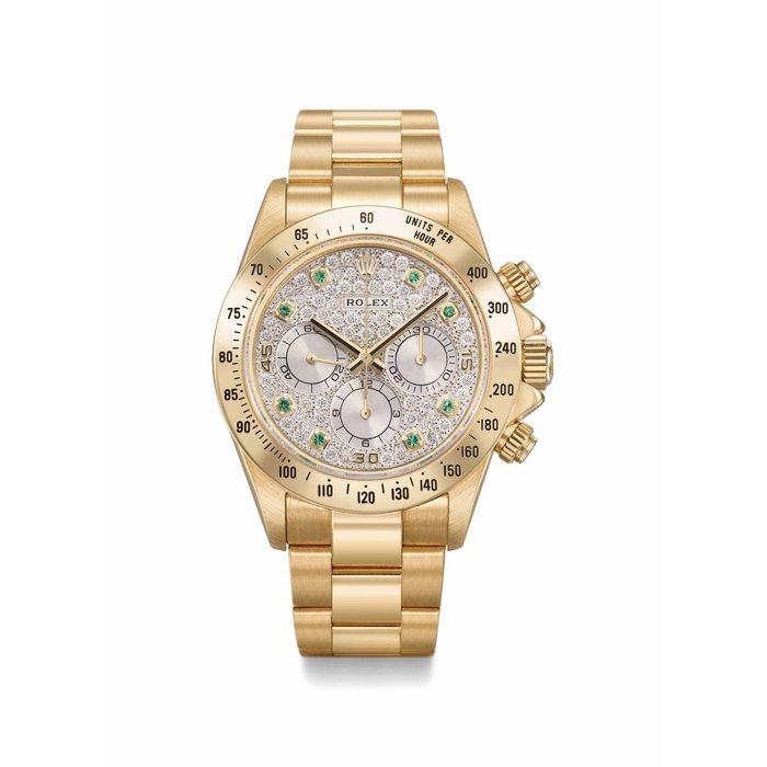 Rolex ROLEX. A VERY RARE AND IMPRESSIVE 18K GOLD DIAMOND AND EMERALD-SET AUTOMATIC CHRONOGRAPH WRISTWATCH WITH BRACELET, WARRANTY AND BOX SIGNED ROLEX, DAYTONA MODEL, REF. 16528, CASE NO. X661624, CIRCA 1991 · 16528