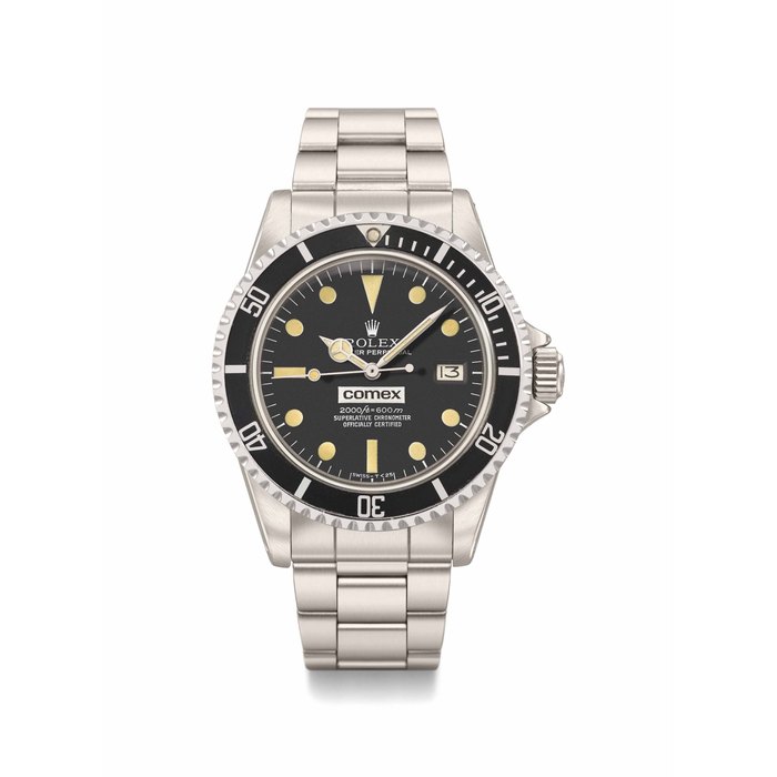 ROLEX. AN EXTREMELY RARE STAINLESS STEEL AUTOMATIC WRISTWATCH WITH SWEEP CENTRE SECONDS, DATE, GAS ESCAPE VALVE, BRACELET AND “RAIL” DIAL, MADE FOR COMEX SIGNED ROLEX, OYSTER PERPETUAL, COMEX, 2000FT=600M, SUPERLATIVE CHRONOMETER, OFFICIALLY CERTIFIED, REF. 1665, CASE NO. 6’176’864, CIRCA 1979