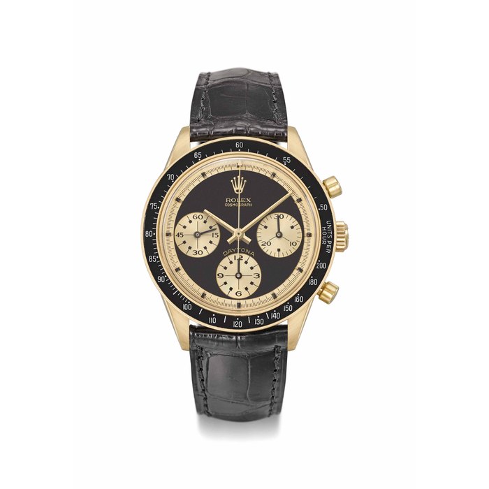 Rolex. An exceptionally rare and highly attractive 18K gold chronograph wristwatch with black “John Player Special Paul Newman” dial Signed Rolex, Cosmograph, Daytona, Paul Newman John Player Special model, ref. 6241, case no. 1’947’369, manufactured in 1969