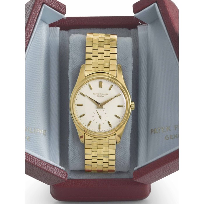 Patek Philippe. A Fine, Rare and Attractive 18k Gold Automatic Wristwatch with Enamel Dial and Bracelet Signed Patek Philippe, Genève, Retailed by Hausmann & Co., Ref. 2526, Movement No. 761'455, Case No. 686'632, Manufactured in 1954