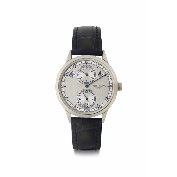 Patek Philippe. A Fine and Rare 18k White Gold Automatic Annual Calendar Wristwatch with Regulator-Style Dial Signed Patek Philippe, Genève, Ref. 5235G-001, Movement No. 5'728'044, Case No. 4'690'071, Circa 2015