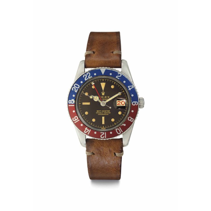 Rolex. A Fine Stainless Steel Automatic Dual Time Wristwatch with Date, Center Seconds and "Tropical" Dial Signed Rolex, Oyster Perpetual, GMT-Master, Ref. 6542, Case No. 426'702 Circa 1959