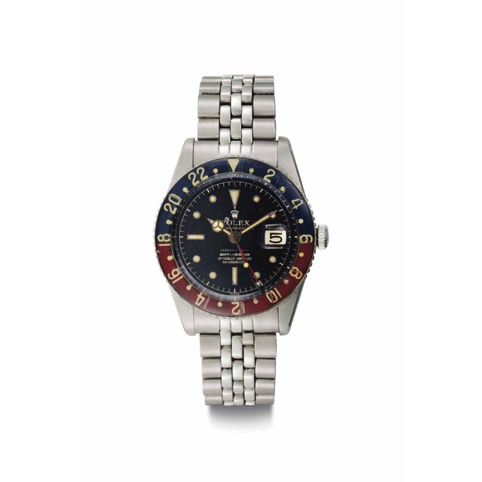Rolex. A Very Rare and Highly Attractive Stainless Steel Automatic Dual time Wristwatch with Date and Bracelet Signed Rolex, Oyster-Perpetual, GMT-Master, Retailed by Serpico Y Laino, Ref. 6542, Case No. 356'053, Circa 1958