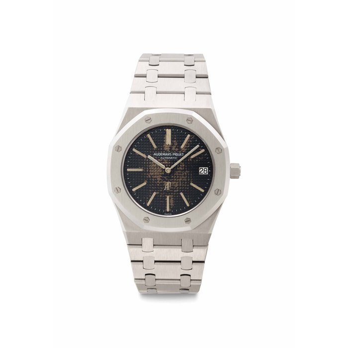 Audemars Piguet. A Fine Stainless Steel Automatic Wristwatch with Date, Bracelet and "Tropical" Dial Signed Audemars Piguet, Automatic, Royal Oak A-Series Model, Ref. 5402ST, Movement No. 138697, Case No. 80532, No. A 1532, Manufactured in 1974
