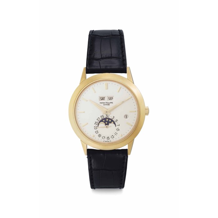 Patek Philippe. A Very Fine and Rare 18k Gold Automatic Perpetual Calendar Wristwatch With Moon Phases and Leap Year Indication Signed Patek Philippe, Genève, Ref. 3450, Movement No. 1'119'771, Case No. 2'808'547, Manufactured in 1985