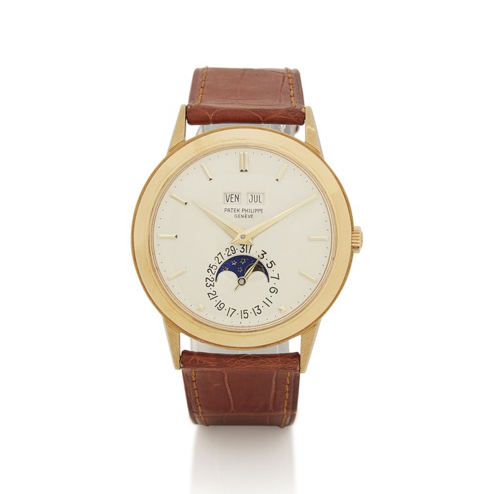 Patek Philippe. A very fine and rare 18K gold automatic perpetual calendar wristwatch with moon phases Signed Patek Philippe, Genève, Ref. 3448, Movement No. 1’119’397, Case No. 331’488, Manufactured in 1975