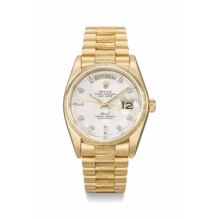ROLEX. A VERY FINE AND EXTREMLY RARE 18K GOLD & DIAMOND-SET AUTOMATIC WRISTWATCH WITH DAY, DATE, SWEEP CENTRE SECONDS, BRACELET, SERVICE GUARANTEE, COPIES OF SERVICE INVOICE, LETTER AND BOX, MADE FOR HIS HIGHNESS SHEIKH MOHAMMED BIN RASHID AL MAKTOUM SIGNED ROLEX, OYSTER PERPETUAL, DAY-DATE, REF. 18078, CASE NO. 6127141, CIRCA 1979