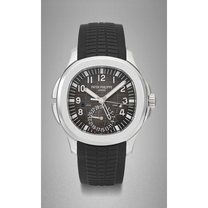 Patek Philippe. A fine stainless steel cushion-shaped automatic dual time wristwatch with sweep centre seconds, date and day and night indication, original certificate and box Signed Patek Philippe, Genève, Aquanaut Travel Time model, ref. 5164A-001, movement no. 5'643'624, case no. 4'758'234, circa 2012