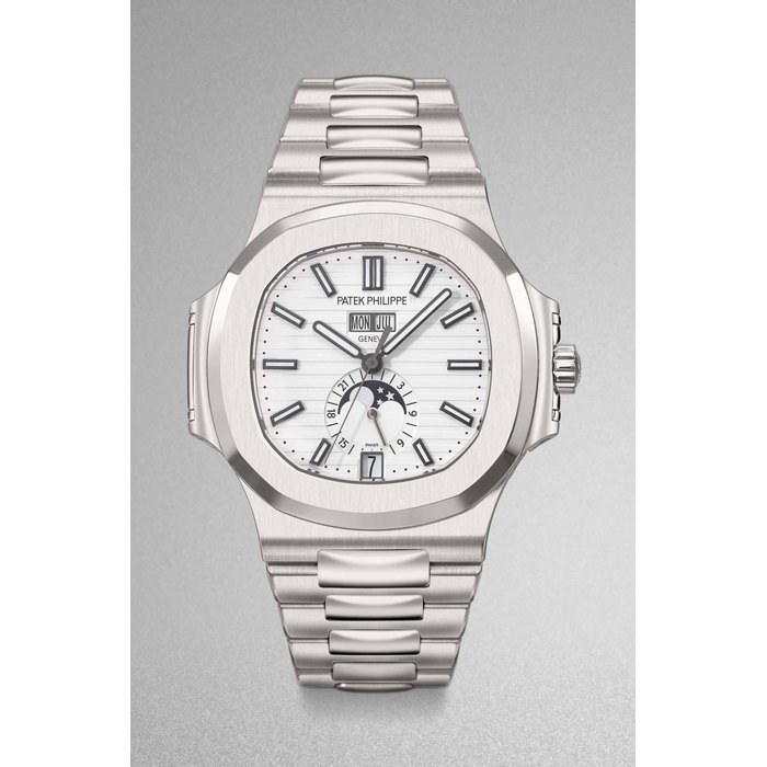 Patek Philippe. A fine and rare stainless steel automatic annual calendar wristwatch with sweep centre seconds, moon phases, 24 hour indication, bracelet, original certificate and box Signed Patek Philippe, Genève, Nautilus model, ref. 5726/1A-010, movement no. 5’782’633, case no. 4’665’937, circa 2013