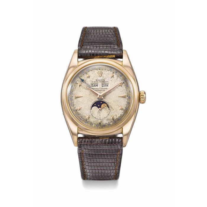 Rolex Rolex. An extremely rare and early, attractive and important 18K pink gold automatic triple calendar wristwatch with moon phases and star dial Signed Rolex, Oyster Perpetual, Officially Certified Chronometer, Ref. 6062, case no. 690'042, circa 1950 · 6062