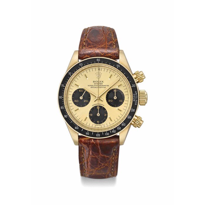 Rolex. A very fine and rare 14K gold chronograph wristwatch with champagne dial Signed Rolex, Oyster, Cosmograph, Ref. 6263, Case No. 5’427’434, Circa 1978