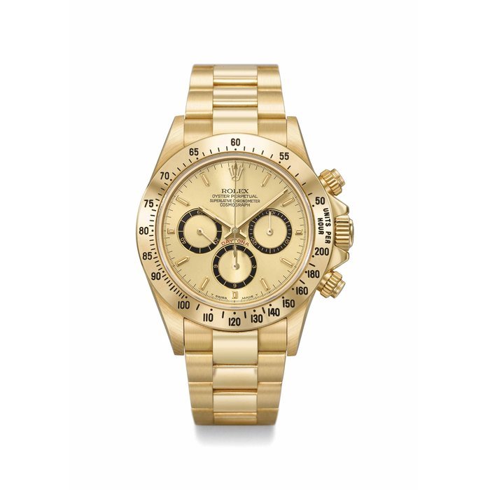 Rolex Rolex. A rare and attractive 18K gold automatic chronograph wristwatch with bracelet and “Four Line” champagne dial Signed Rolex, Oyster Perpetual, Cosmograph, Daytona, Ref. 16528, Case No. L236120, Circa 1989 · 16528