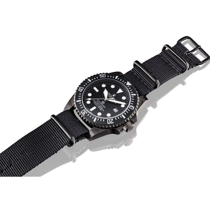 SPECIAL FORCES ISSUE. A PVD-COATED STAINLESS STEEL AUTOMATIC WRISTWATCH WITH SWEEP CENTRE SECONDS AND DATE SIGNED ROLEX, OYSTER PERPETUAL, SC, SUBMARINER MODEL, REF. 116610LN, CASE NO. 842AN789, CIRCA 2016