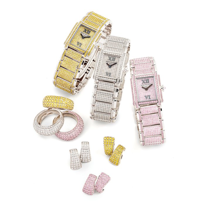 PATEK PHILIPPE. AN EXTREMELY RARE SET OF THREE LADY'S VERY FINE AND ELEGANT 18K WHITE GOLD, DIAMOND, PINK OR YELLOW DIAMOND-SET RECTANGULAR BRACELET WATCH, EACH WITH A MATCHING PAIR OF EARRINGS AND A RING SIGNED PATEK PHILIPPE, GENEVE, TWENTY~4 MODEL, DIAMOND-SET WATCH, REF. 4909/50, MOVEMENT NO. 3'369'004, CASE NO. 4'243'204, MANUFACTURED IN 2003, PINK DIAMOND-SET WATCH, REF. 4909/51, MOVEMENT NO. 3'369'006, CASE NO. 4'249'546, MANUFACTURED IN 2003, YELLOW DIAMOND-SET WATCH, REF. 4909/52, MOVEM