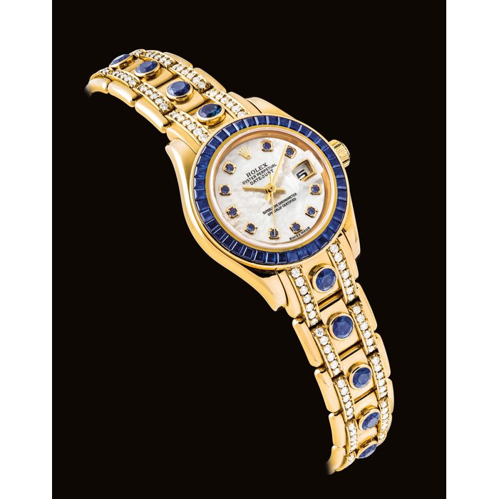 ROLEX. A LADY’S FINE AND RARE 18K GOLD, DIAMOND AND SAPPHIRE-SET AUTOMATIC WRISTWATCH WITH SWEEP CENTRE SECONDS, DATE, BRACELET AND MOTHER-OF-PEARL DIAL SIGNED ROLEX, OYSTER PERPETUAL DATEJUST, PEARLMASTER MODEL, REF. 80308, CASE NO. K550990, CIRCA 2001
