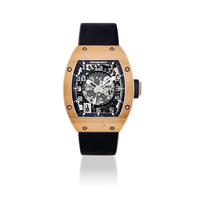 RICHARD MILLE. A FINE AND RARE 18K PINK GOLD TONNEAU-SHAPED AUTOMATIC SKELETONISED WRISTWATCH WITH SWEEP CENTRE SECONDS AND DATE SIGNED RICHARD MILLE, REF. RM010 AH RG, CASE NO.1577, MOVEMENT NO. 1283, CIRCA 2005