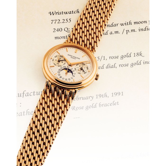 PATEK PHILIPPE. A FINE 18K PINK GOLD AUTOMATIC PERPETUAL CALENDAR BRACELET WATCH WITH MOON PHASES, 24 HOUR AND LEAP YEAR INDICATION SIGNED PATEK PHILIPPE, GENEVE, REF. 3945, MOVEMENT NO. 772255, CASE NO. 2'867'001, MANUFACTURED IN 1990