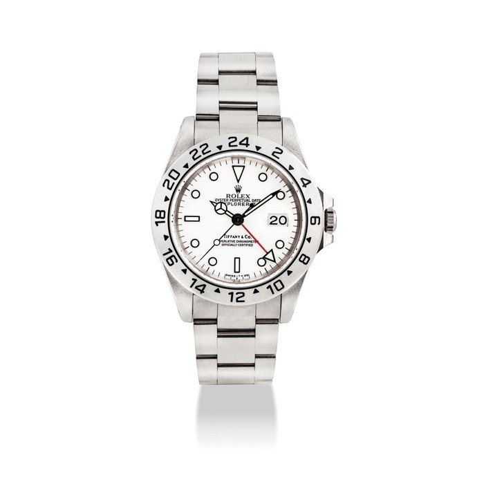 Rolex ROLEX. A RARE STAINLESS STEEL AUTOMATIC DUAL TIME WRISTWATCH WITH SWEEP CENTRE SECONDS, DATE AND BRACELET SIGNED ROLEX, RETAILED BY TIFFANY & CO., OYSTER PERPETUAL, EXPLORER II, REF. 16570, CASE NO. S853354, CIRCA 1993 · 16570