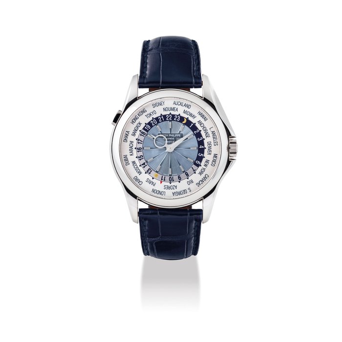 PATEK PHILIPPE. A FINE AND RARE PLATINUM AUTOMATIC WORLD TIME WRISTWATCH SIGNED PATEK PHILIPPE, GENEVE, REF. 5130, MOVEMENT NO. 3'671'201, CASE NO. 4'427'013, CIRCA 2008