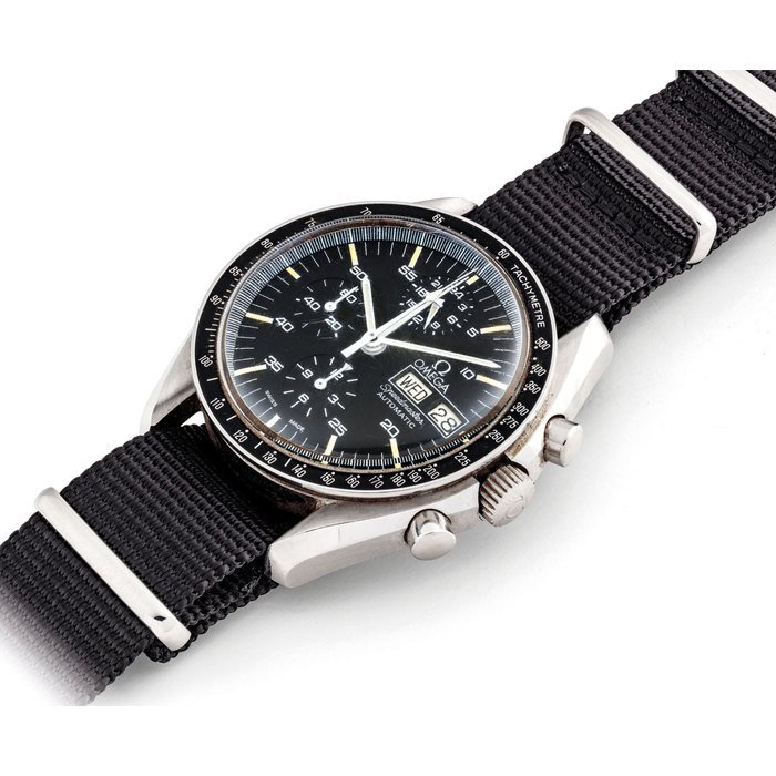 Omega OMEGA. A RARE STAINLESS STEEL AUTOMATIC CHRONOGRAPH WRISTWATCH WITH DAY, DATE, 24 HOUR DISPLAY AND CENTRAL MINUTE REGISTER SIGNED OMEGA, SPEEDMASTER, REF. ST 376.0822, MOVEMENT NO. 48'233'280, CIRCA 1987