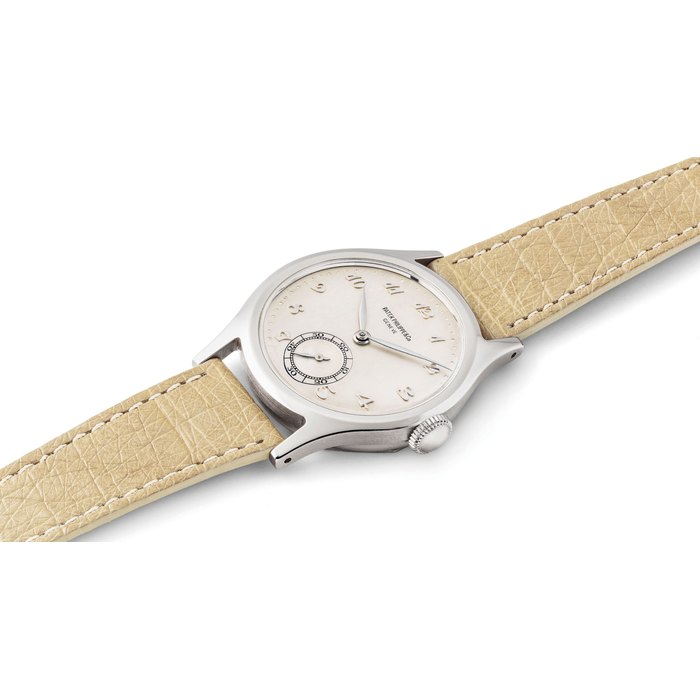 PATEK PHILIPPE. A FINE AND VERY RARE STAINLESS STEEL WRISTWATCH WITH BREGUET NUMERALS SIGNED, PATEK PHILIPPE & CO, GENEVE, REF. 565, MOVEMENT NO. 929'367, CASE NO. 639'902, MANUFACTURED IN 1946