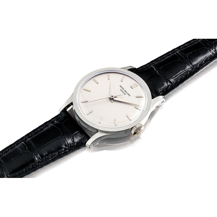 PATEK PHILIPPE. A FINE AND RARE 18K WHITE GOLD WRISTWATCH WITH SWEEP CENTRE SECONDS SIGNED PATEK PHILIPPE, GENEVE, CALATRAVA MODEL, REF. 570, MOVEMENT NO. 710'298, CASE NO. 312982, MANUFACTURED IN 1962