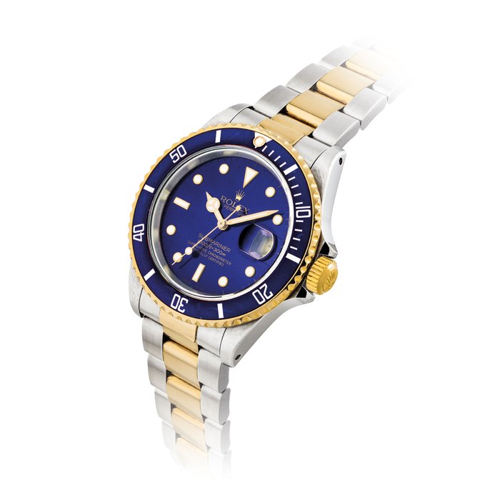ROLEX. A STAINLESS STEEL AND 18K GOLD AUTOMATIC WRISTWATCH WITH SWEEP CENTRE SECONDS, DATE AND BRACELET SIGNED ROLEX, OYSTER PERPETUAL, SUBMARINER MODEL, REF. 16613, CASE NO. E760397, CIRCA 1990