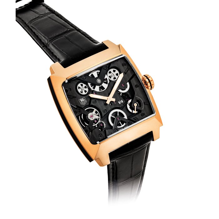 TAG HEUER. AN UNUSUAL, FINE AND RARE 18 PINK GOLD AND CERAMIC LIMITED EDITION SQUARE AUTOMATIC SEMI-SKELETONISED WRISTWATCH WITH BELT-TRANSMISSION SYSTEM SIGNED TAG HEUER, MONACO V4 MODEL, NO. 50/60, REF. WAW2040.FC6288, CIRCA 2011