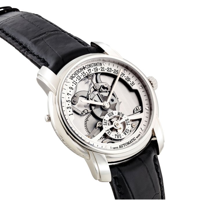 VACHERON CONSTANTIN. A FINE AND RARE PLATINUM LIMITED EDITION AUTOMATIC SEMI-SKELETONISED WRISTWATCH WITH DAY AND RETROGRADE DATE, MADE TO COMMEMORATE THE 247TH ANNIVERSARY OF VACHERON CONSTANTIN SIGNED VACHERON CONSTANTIN, GENEVE, PATRIMONY RETROGRADE MODEL, NO. 79/247, REF. 47245, MOVEMENT NO. 887'677, CASE NO. 768'589, CIRCA 2002