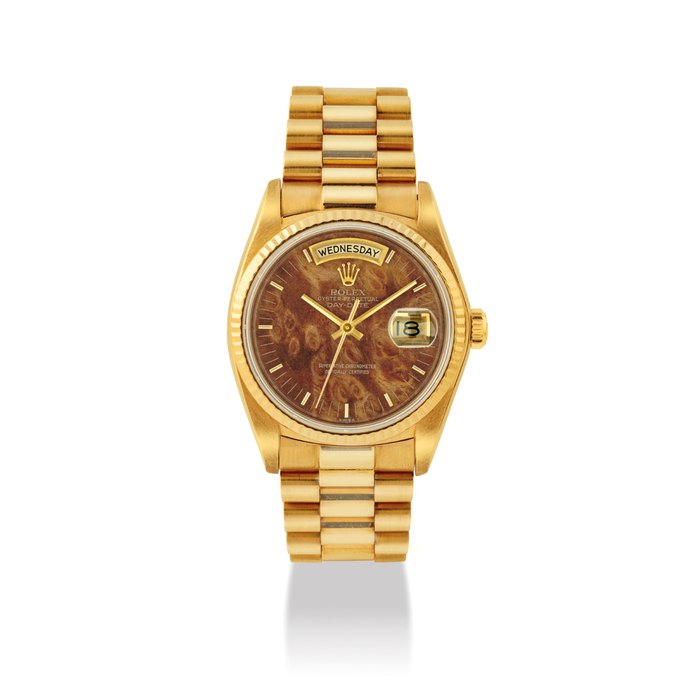 ROLEX. A RARE AND ATTRACTIVE 18K GOLD AUTOMATIC WRISTWATCH WITH SWEEP CENTRE SECONDS, DAY, DATE , BRACELET AND WOOD DIAL SIGNED ROLEX, OYSTER PERPETUAL, DAY-DATE MODEL, REF. 18038, CASE NO. 5'723'806, CIRCA 1979