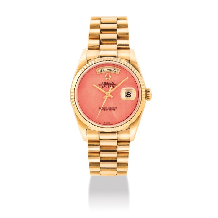 ROLEX. A FINE AND VERY RARE 18K GOLD AUTOMATIC WRISTWATCH WITH SWEEP CENTRE SECONDS, DAY, DATE, BRACELET, FRENCH CALENDAR AND CORAL DIAL SIGNED ROLEX, OYSTER PERPETUAL, DAY-DATE MODEL, REF. 18238, CASE NO. S158412, CIRCA 1993