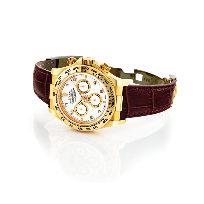 ROLEX. A FINE 18K GOLD AUTOMATIC CHRONOGRAPH WRISTWATCH SIGNED ROLEX, OYSTER PERPETUAL, COSMOGRAPH DAYTONA MODEL, REF. 116518, CASE NO. P104472, CIRCA 2000
