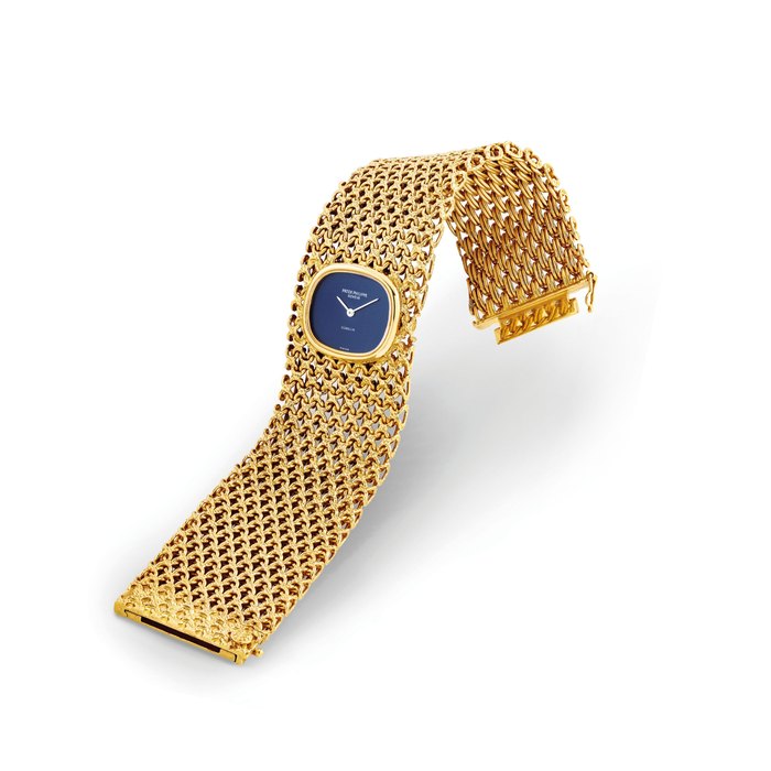 PATEK PHILIPPE. A LADY'S RARE 18K GOLD BRACELET WATCH SIGNED PATEK PHILIPPE, RETAILED BY GUBELIN, REF. 4151/1, MOVEMENT NO. 1'261'586, CASE NO. 2'717'512, MANUFACTURED IN 1972