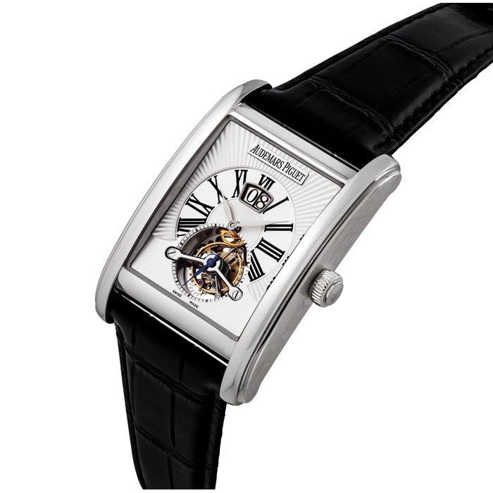 AUDEMARS PIGUET. A FINE 18K WHITE GOLD RECTANGULAR TOURBILLON WRISTWATCH WITH DATE SIGNED AUDEMARS PIGUET, TOURBILLON GRAND DATE MODEL, REF. 26009BC, CASE NO. F 65248, CIRCA 2011