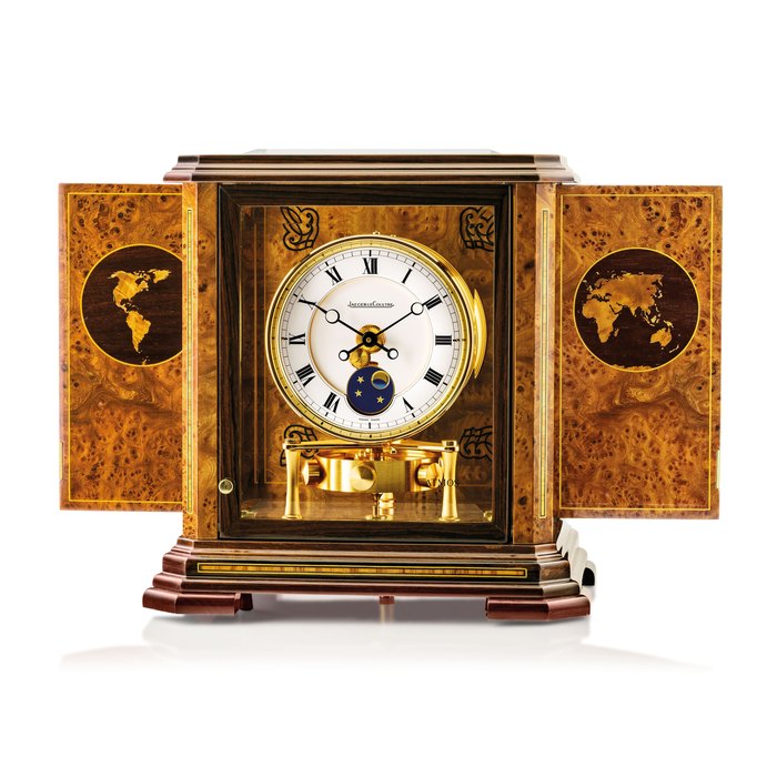 Jaeger-Lecoultre JAEGER-LECOULTRE. A FINE AND RARE WOOD, GILT BRASS AND GLASS ATMOS CLOCK WITH MOON PHASES SIGNED JAEGER-LECOULTRE, ATMOS MODEL, MOVEMENT NO. 684'249, CIRCA 2005, Price & Market Data