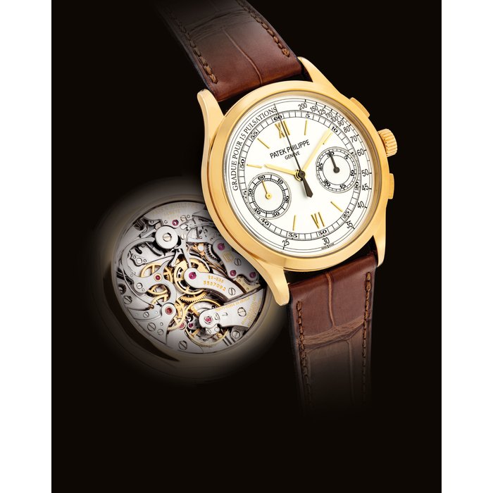 PATEK PHILIPPE. A FINE 18K GOLD CHRONOGRAPH WRISTWATCH WITH PULSATION SCALE SIGNED PATEK PHILIPPE, GENEVE, REF. 5170, MOVEMENT NO. 5'587'092, CASE NO. 4'533'421, CIRCA 2011