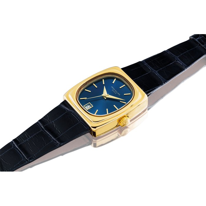 PATEK PHILIPPE. A RARE 18K GOLD RECTANGULAR ELECTRONIC WRISTWATCH WITH SWEEP CENTRE SECONDS AND DATE SIGNED PATEK PHILIPPE, GENEVE, REF. 3603, MOVEMENT NO. 8'151, CASE NO. 2'732'416, MANUFACTURED IN 1974