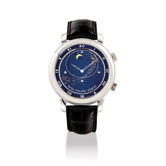 PATEK PHILIPPE. A VERY FINE AND RARE 18K WHITE GOLD AUTOMATIC ASTRONOMICAL WRISTWATCH WITH SKY CHART, PHASES AND ORBIT OF THE MOON INCLUDING TIME OF MERIDIAN PASSAGE OF SIRIUS AND THE MOON SIGNED PATEK PHILIPPE GENEVE, CELESTIAL MODEL, REF. 5102, MOVEMENT NO. 3’328’073, CASE NO. 4’214’500, CIRCA 2004
