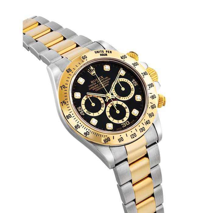 ROLEX. A 18K GOLD, STAINLESS STEEL AND DIAMOND-SET AUTOMATIC CHRONOGRAPH WRISTWATCH WITH BRACELET SIGNED ROLEX, OYSTER PERPETUAL, COSMOGRAPH DAYTONA MODEL, REF. 16523, CASE NO. U258239, CIRCA 1997
