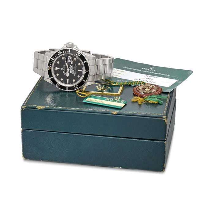 ROLEX. A VERY FINE AND RARE STAINLESS STEEL AUTOMATIC WRISTWATCH WITH DATE, SWEEP CENTRE SECONDS, HACK FEATURE, BRACELET, SALES TAG, INTERNATIONAL SERVICE GUARANTEE AND BOX, MADE FOR COMEX SIGNED ROLEX, OYSTER PERPETUAL DATE, SUBMARINER, COMEX, 1000FT=300M, REF. 16800, CASE NO. 8’269’189, COMEX ISSUE NO. 6139, CIRCA 1983