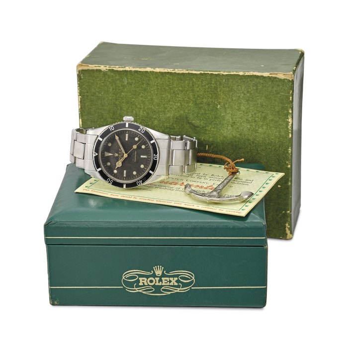 Rolex. A rare stainless steel automatic wristwatch with sweep centre seconds, bracelet, Rolex Oyster Guaranteed 100m/330feet under water anchor, blank guarantee and box SIGNED ROLEX, OYSTER PERPETUAL, SUBMARINER, 100M=330FT, REF. 6536/1, CASE NO. 112’317, CIRCA 1955