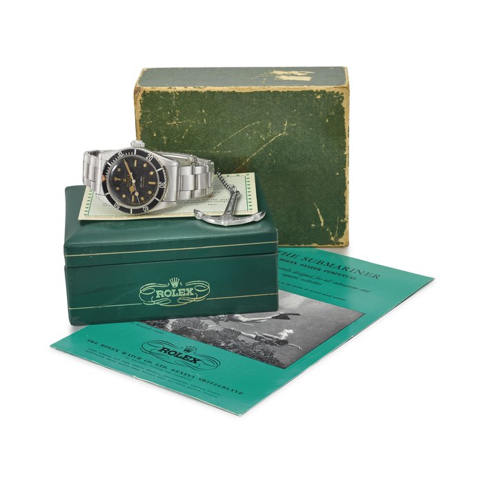 ROLEX. A VERY RARE STAINLESS STEEL AUTOMATIC WRISTWATCH WITH SWEEP CENTRE SECONDS, BLACK LACQUER “SPIDER” DIAL, BRACELET, ROLEX OYSTER GUARANTEED 200M/660FEET UNDER WATER ANCHOR, BLANK GUARANTEE, BROCHURE AND BOX SIGNED ROLEX, OYSTER PERPETUAL, SUBMARINER, 200M=660FT, REF. 5510, CASE NO. 361’963, CIRCA 1958