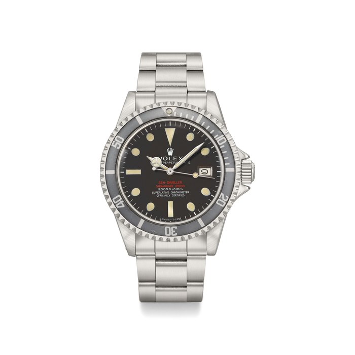 Rolex. A rare stainless steel automatic wristwatch with sweep centre seconds, helium gas escape valve, date, bracelet, brochure, retailer’s Sea-Dweller metal product display sign and box Signed Rolex, Oyster Perpetual Date, Sea-Dweller, Submariner 2000, 2000ft=610m, Superlative Chronometer, Officially Certified, Double Red model, ref. 1665, case no. 1’760’311, circa 1967/68