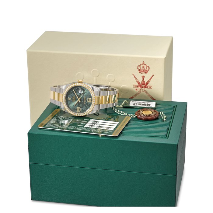 ROLEX. A FINE 18K GOLD, STAINLESS STEEL AND DIAMOND-SET AUTOMATIC WRISTWATCH WITH GREEN FLORAL DIAL, ENGRAVED CASE BACK, SWEEP CENTRE SECONDS, DATE, INTERNATIONAL GUARANTEE AND BRACELET, MADE FOR THE SULTANATE OF OMAN SIGNED ROLEX, OYSTER PERPETUAL, DATEJUST, REF. 116243, CASE NO. 6775T235, CIRCA 2013