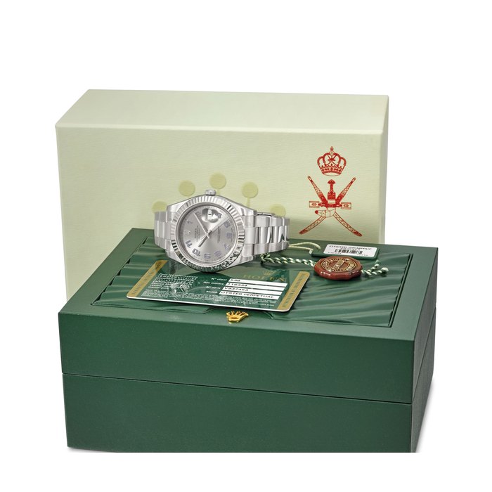 ROLEX. A RARE AND FINE 18K WHITE GOLD AND STAINLESS STEEL AUTOMATIC WRISTWATCH WITH ENGRAVED CASE BACK, SWEEP CENTRE SECONDS, DATE, INTERNATIONAL GUARANTEE AND BRACELET, MADE FOR THE SULTANATE OF OMAN SIGNED ROLEX, OYSTER PERPETUAL, DATEJUST, REF. 116334, CASE NO. V937453, CIRCA 2010