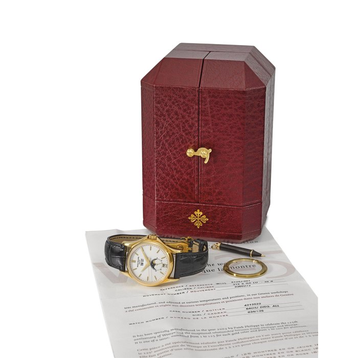 Patek Philippe. A very fine and rare 18K gold annual calendar limited edition automatic wristwatch with sweep centre seconds, 24-hour indication, moon phases, original certificate, box, second case back, pin, made for the 125th anniversary of Wempe Signed Patek Philippe, Genève, made for and retailed by Wempe, ref. 5125J - W125, movement no. 3’360’273, case no. 4’213’522, limited edition no. 034/125, made in 2003