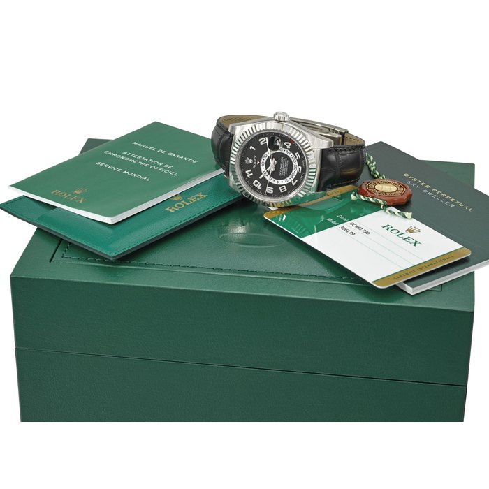 ROLEX. A VERY FINE 18K WHITE GOLD AUTOMATIC DUAL TIME ANNUAL CALENDAR WRISTWATCH WITH SWEEP CENTRE SECONDS, ORIGINAL GUARANTEE AND BOX SIGNED ROLEX, OYSTER PERPETUAL, SKY-DWELLER, REF. 326139, CASE NO. 0C461730, CIRCA 2014